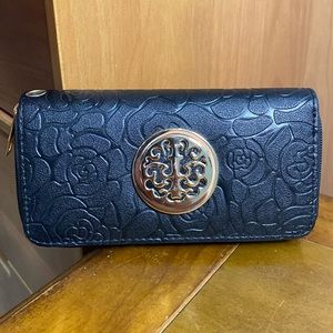 Lovely clutch wallet. New, never used.